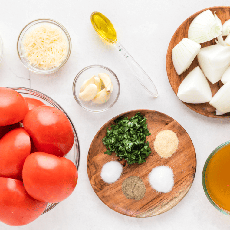 Ingredients needed for Air Fryer Salsa on kitchen table.