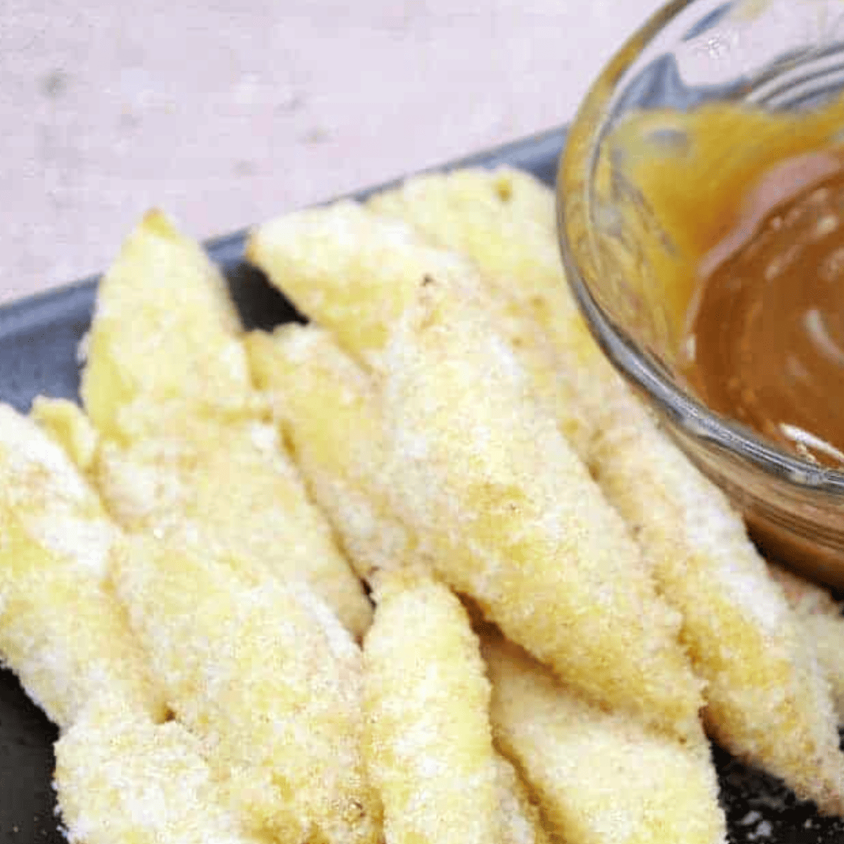 Delicious Cracker Barrel-style fried apples served warm with a sprinkle of cinnamon.