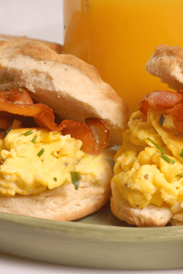 Golden brown canned biscuits cooked in an air fryer, showing fluffy layers and crisp tops.
