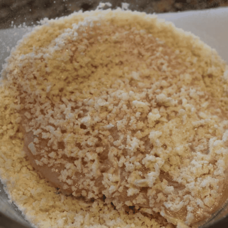 Chicken cutlet coated in panko and Parmesan breadcrumbs on a plate