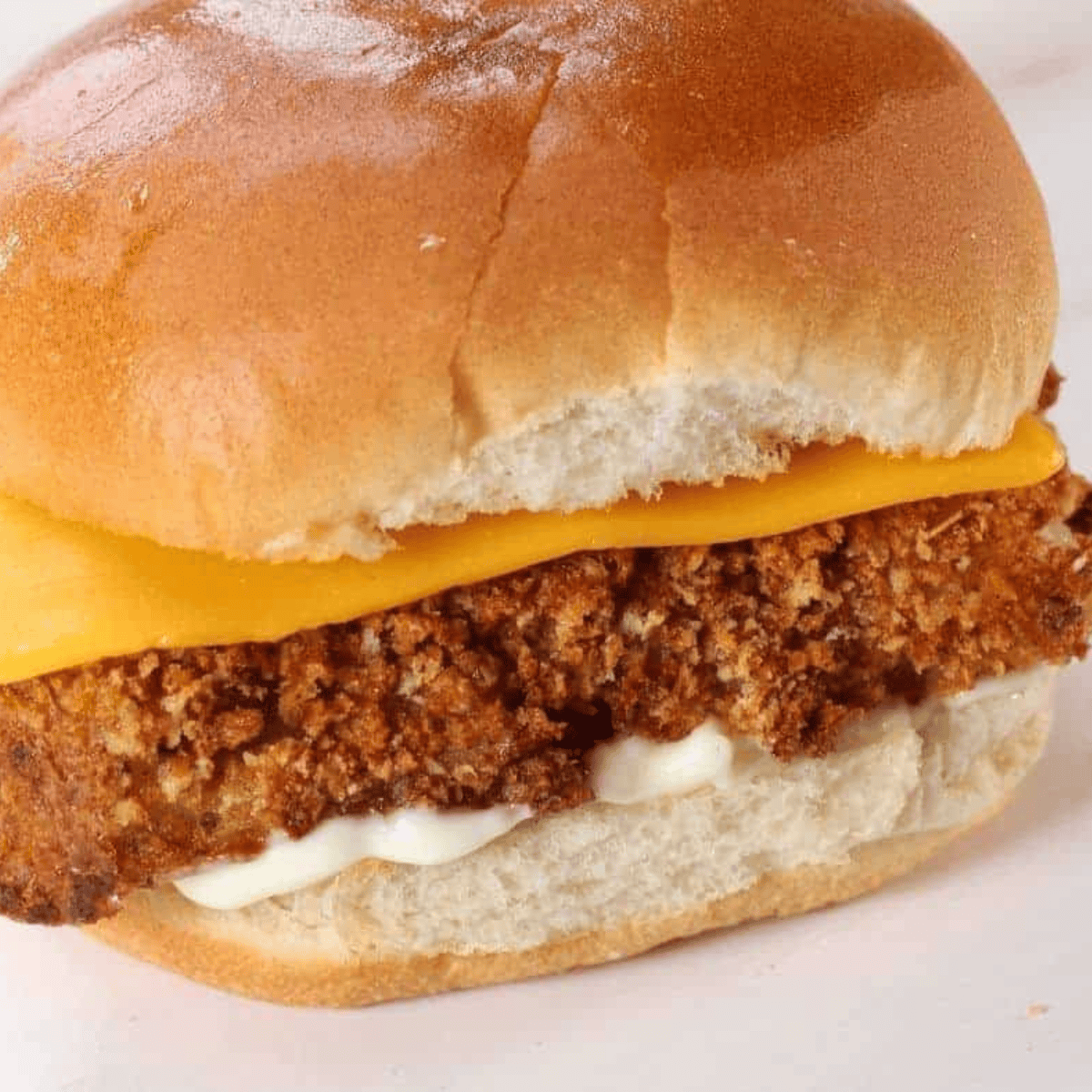 Air Fryer Copycat McDonald's Filet-O-Fish served with crispy breaded fish fillets, toasted buns, and tartar sauce.