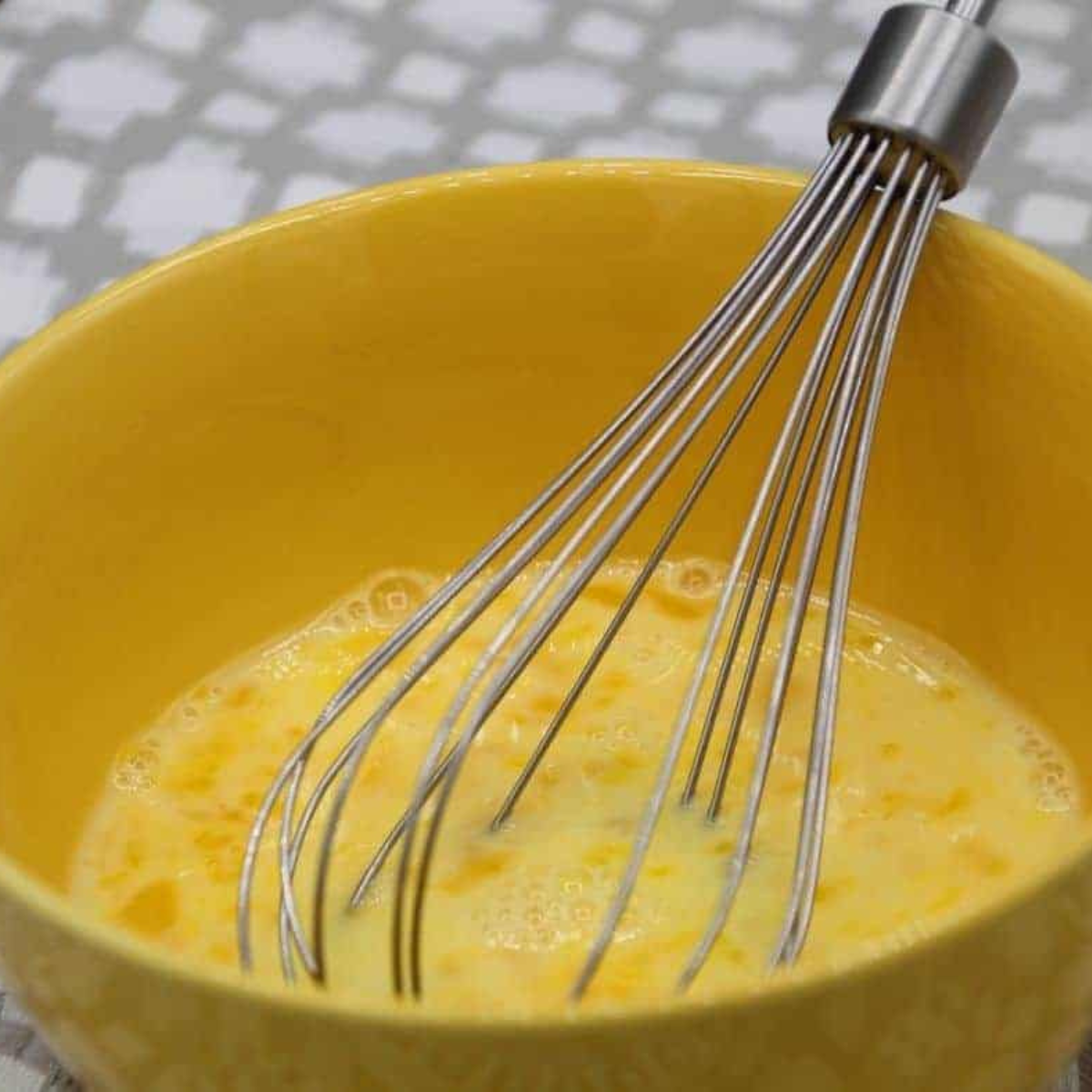 Air fryer digital display set to 325°F preheating for an air fryer ham and cheese omelette.