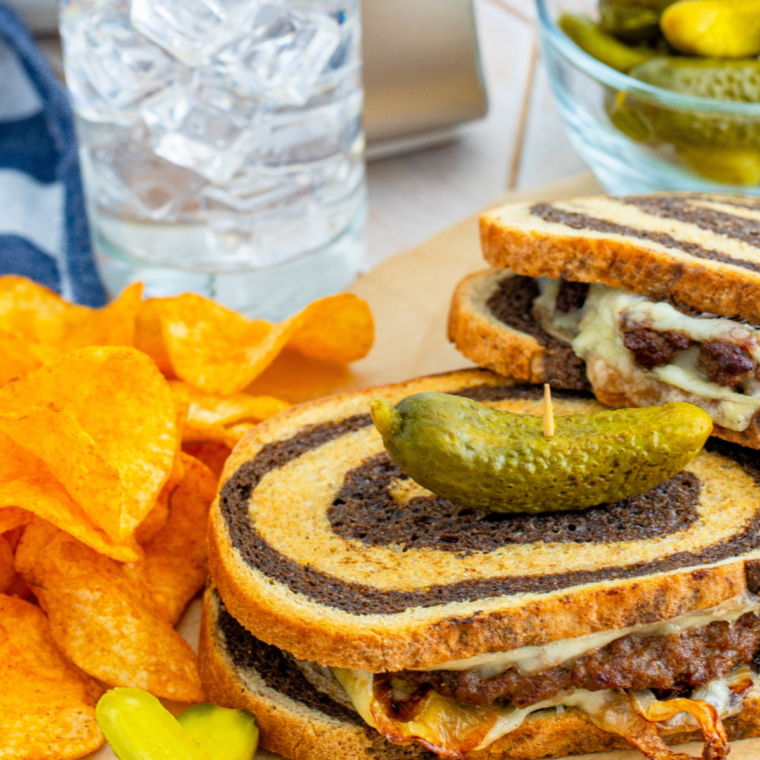 Air Fryer Patty Melt with Swiss cheese, seasoned beef patty, and caramelized onions on rye bread, cooked to crispy perfection in the air fryer.