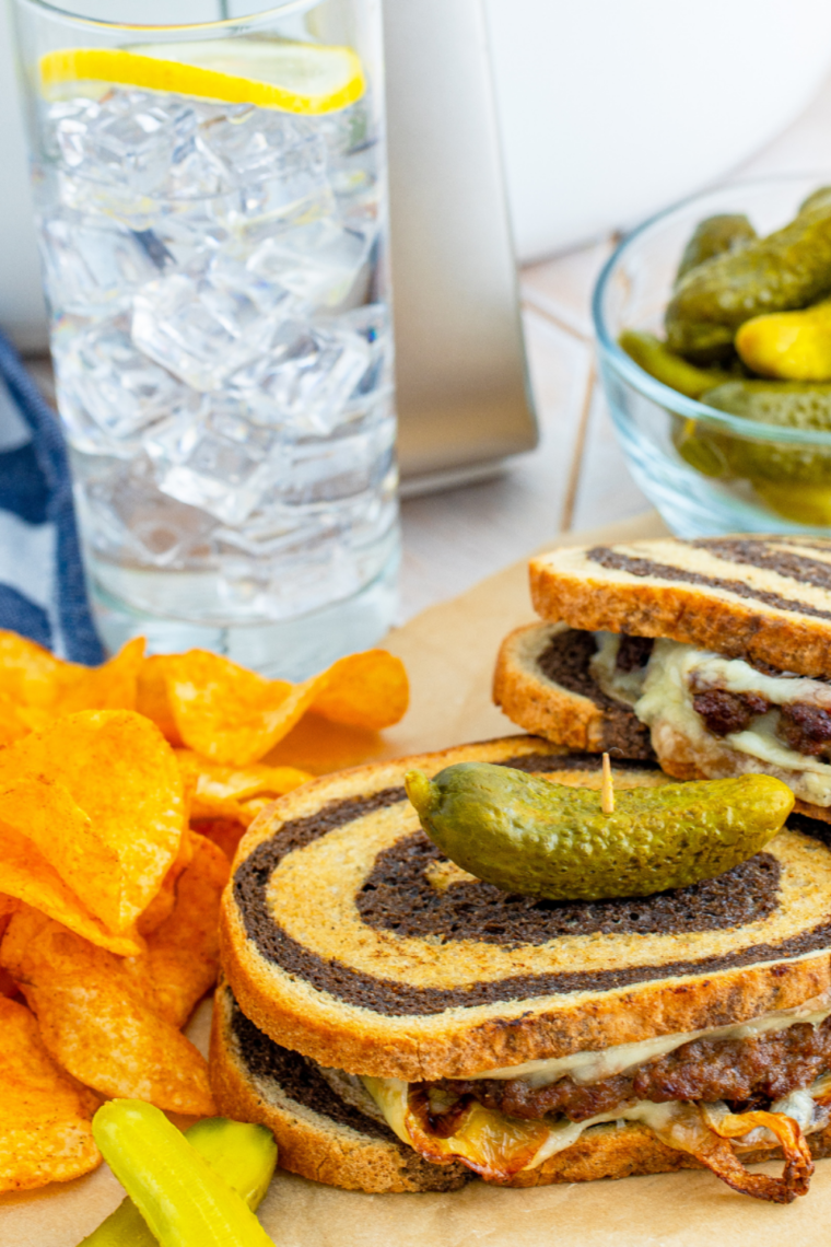 Air Fryer Patty Melt with Swiss cheese, caramelized onions, and juicy beef patty on toasted rye bread