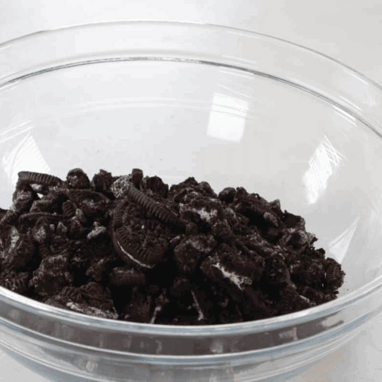 Crushing the Oreos, for the filling.