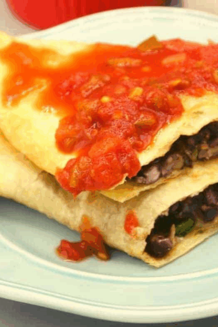 Crispy air fryer black bean quesadillas filled with cheese and beans