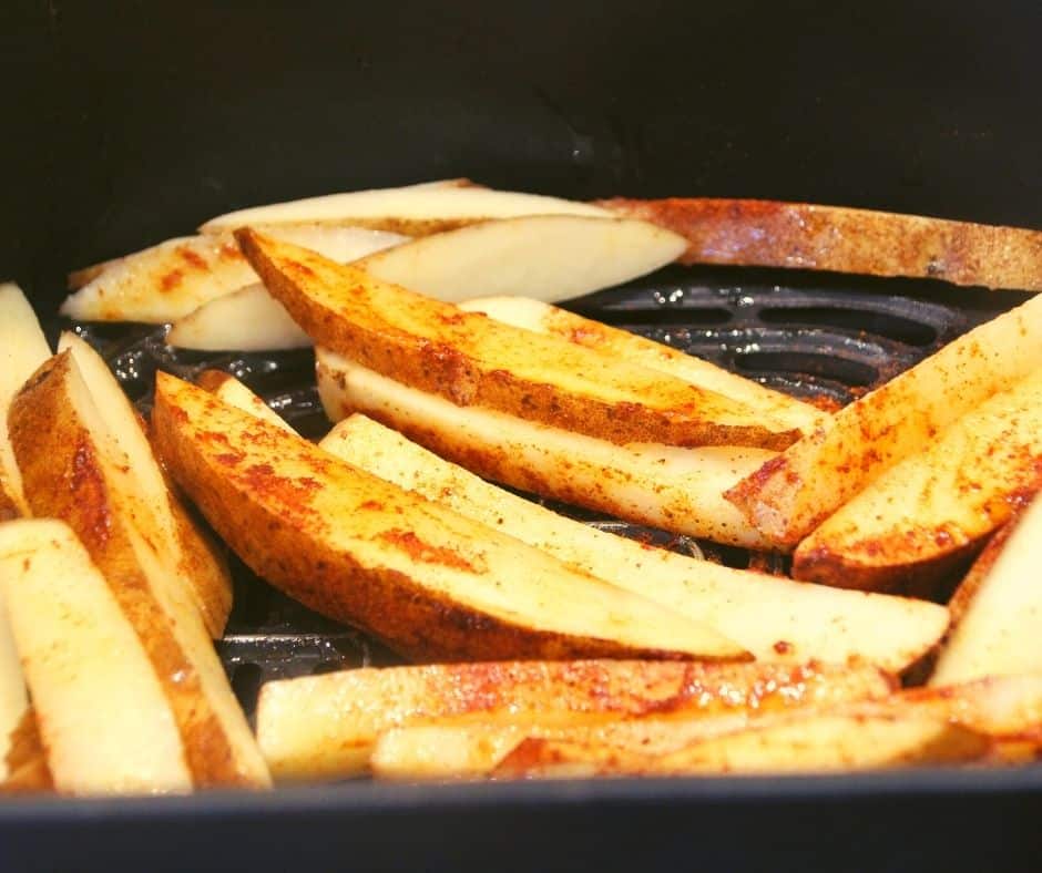 Air Fry the Fries: Carefully arrange the seasoned fries in the air fryer basket in a single layer, ensuring they aren't overcrowded. Cook in batches if necessary. Air fry at 375°F (190°C) for 15-18 minutes, shaking the basket or tossing the fries halfway through to promote even cooking.
Check for Doneness: Keep an eye on the fries and cook until they reach your desired level of crispiness. You can adjust the cooking time for softer or extra crispy fries.
Serve Hot: Once your Spicy Chili French Fries are perfectly golden and crispy, remove them from the air fryer. Serve them immediately with your favorite dipping sauce or enjoy them just as they are.
