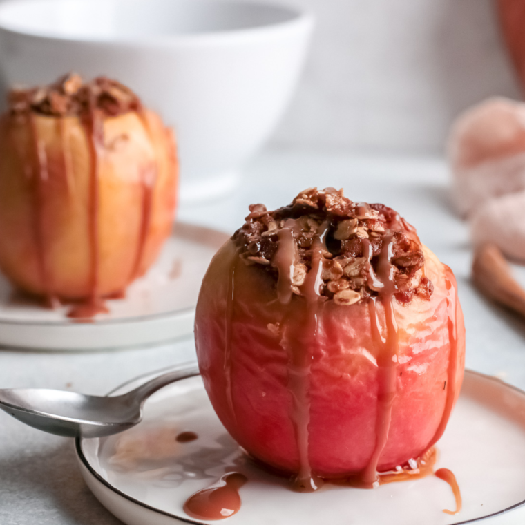 Air fryer baked apples stuffed with cinnamon oat filling, caramelized and tender, served warm as an easy 20-minute dessert with ice cream and caramel drizzle.