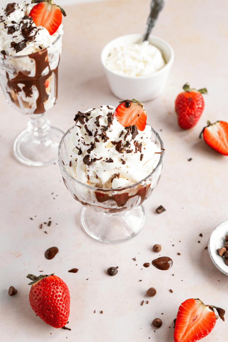 Air Fryer Blondie Brownie Cheesecake Sundae with a scoop of vanilla ice cream on top