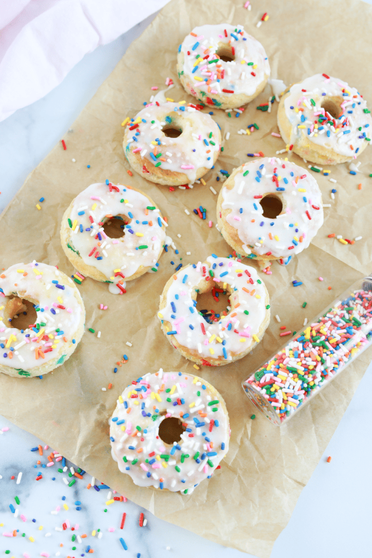 Close-up of a glazed air fryer Funfetti donut with sprinkles