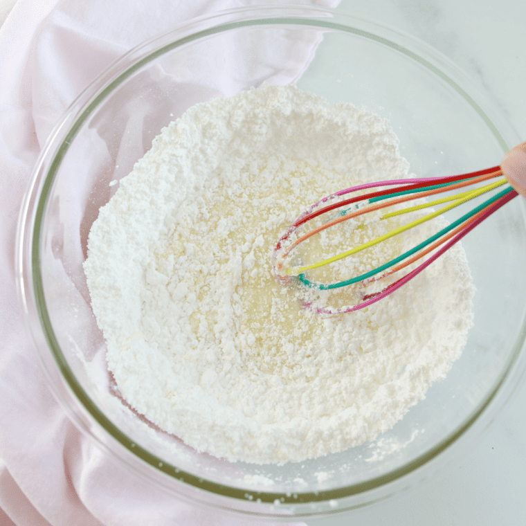 Ingredients laid out for air fryer Funfetti cake mix donuts