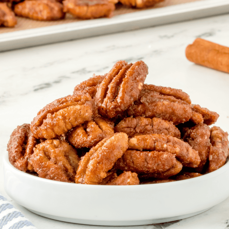 Golden, crunchy candied pecans cooked in the air fryer, ready to serve.