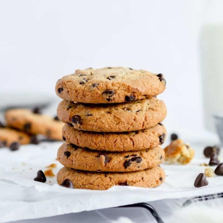 Golden brown copycat DoubleTree cookies baked in the air fryer, filled with melted chocolate chips and crunchy walnuts.