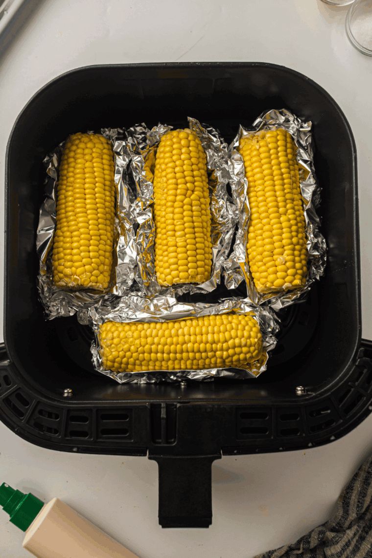 Place corn in the air fryer basket, single layer.