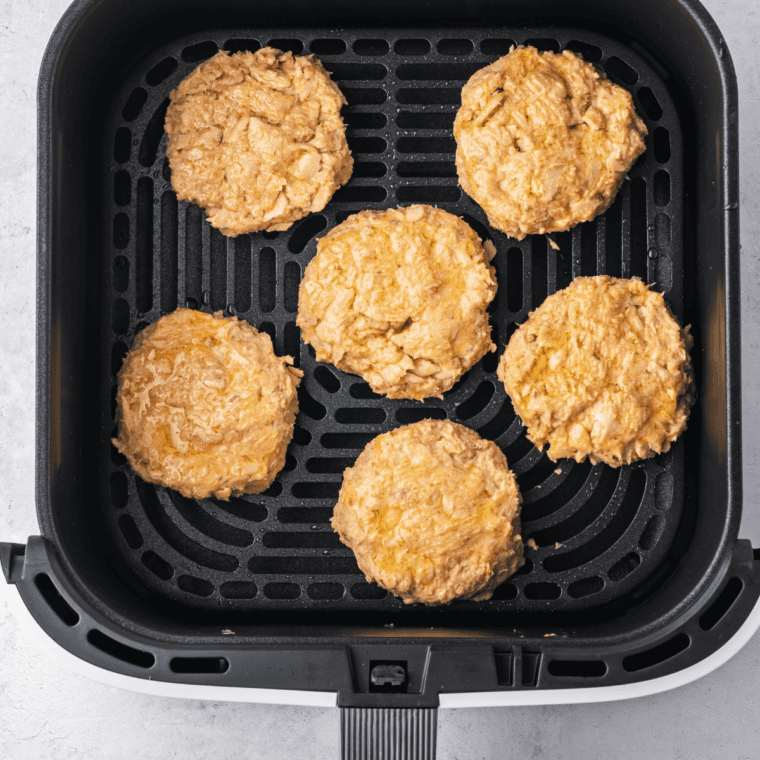 Setting air fryer to 375°F (190°C) and allowing it to preheat for 3 minutes.