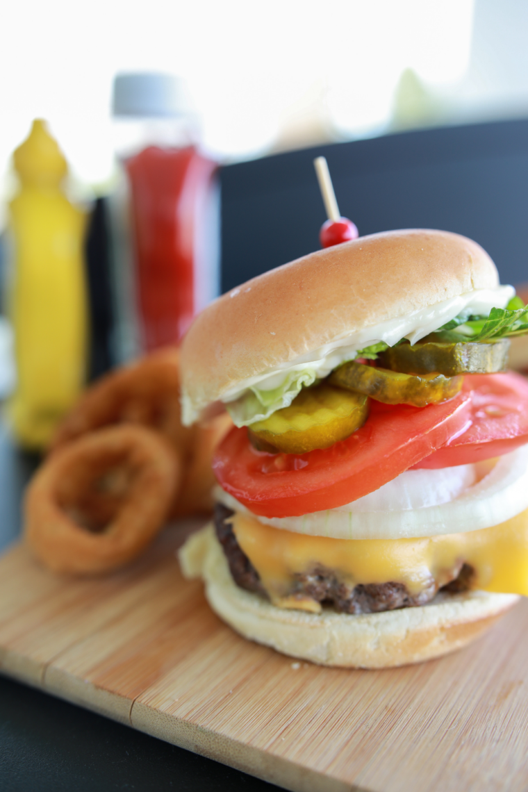 Homemade Blackstone smash burgers served with toasted buns and classic toppings.