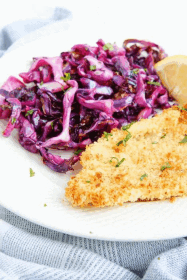 Crispy Air Fryer Red Cabbage in a white bowl, golden edges and tender inside, ready to serve as a healthy side dish.