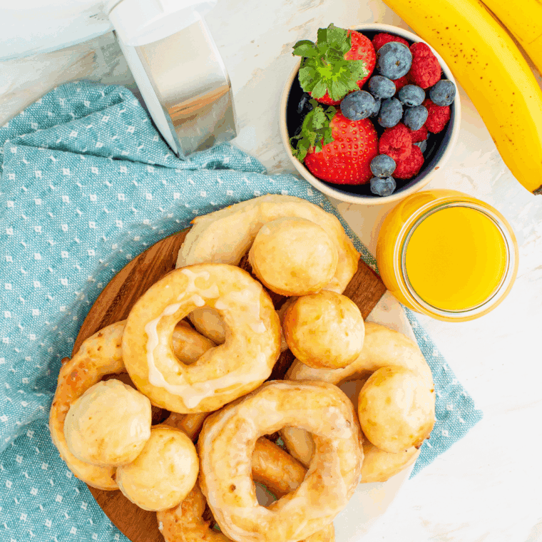Air fryer copycat Krispy Kreme donuts with shiny sugar glaze