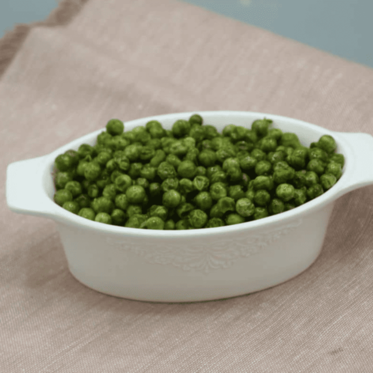 Air-fried frozen peas, crispy and golden, ready to serve as a tasty side dish or snack.