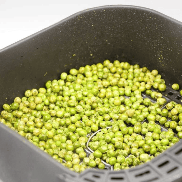 Golden, crispy air fryer frozen peas ready to be served as a tasty snack or side dish.