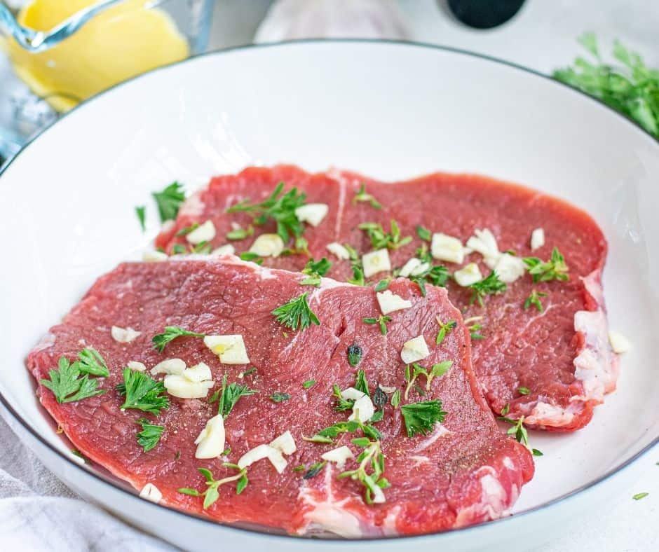 Season The Steak With Salt, Pepper, Fresh Herbs, and Minced Garlic,