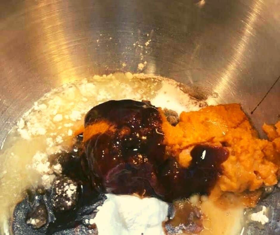 Mix ingredients for pumpkin bread in a large mixing bowl.