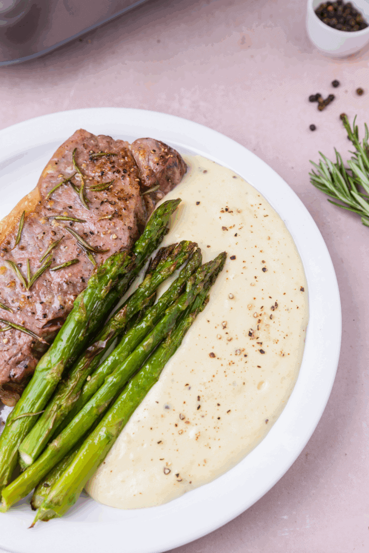 Crisp-tender Blackstone griddle asparagus finished with garlic, lemon, and Parmesan