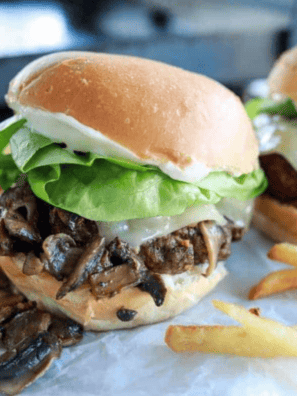 Make irresistible Blackstone Mushroom Swiss Smash Burgers with crispy smashed patties, savory mushrooms, and melted Swiss cheese – perfect for any burger lover!