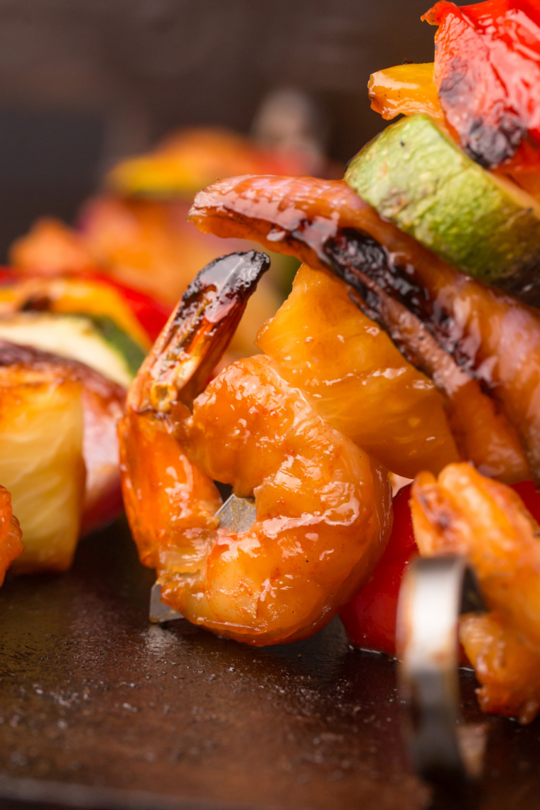 Close-up of garlic butter shrimp cooking on Blackstone flat top grill