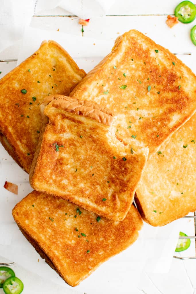 Golden, crispy Air Fryer Jalapeño Popper Grilled Cheese with melty cheese and spicy jalapeños.