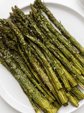 Parmesan-roasted asparagus inspired by Olive Garden, featuring tender asparagus spears topped with melted cheese and crispy golden edges.