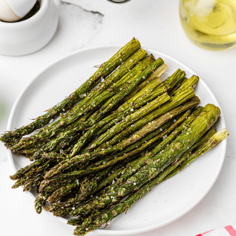 Oven-roasted asparagus topped with melted Parmesan cheese, inspired by Olive Garden’s famous side dish.