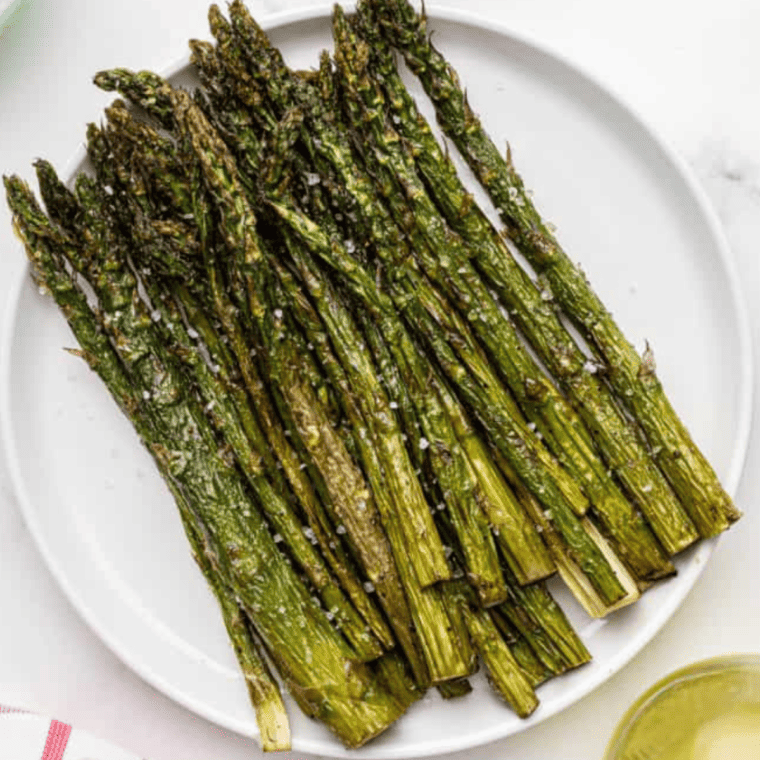 Olive Garden-style Parmesan roasted asparagus served with balsamic vinegar and parmesan.