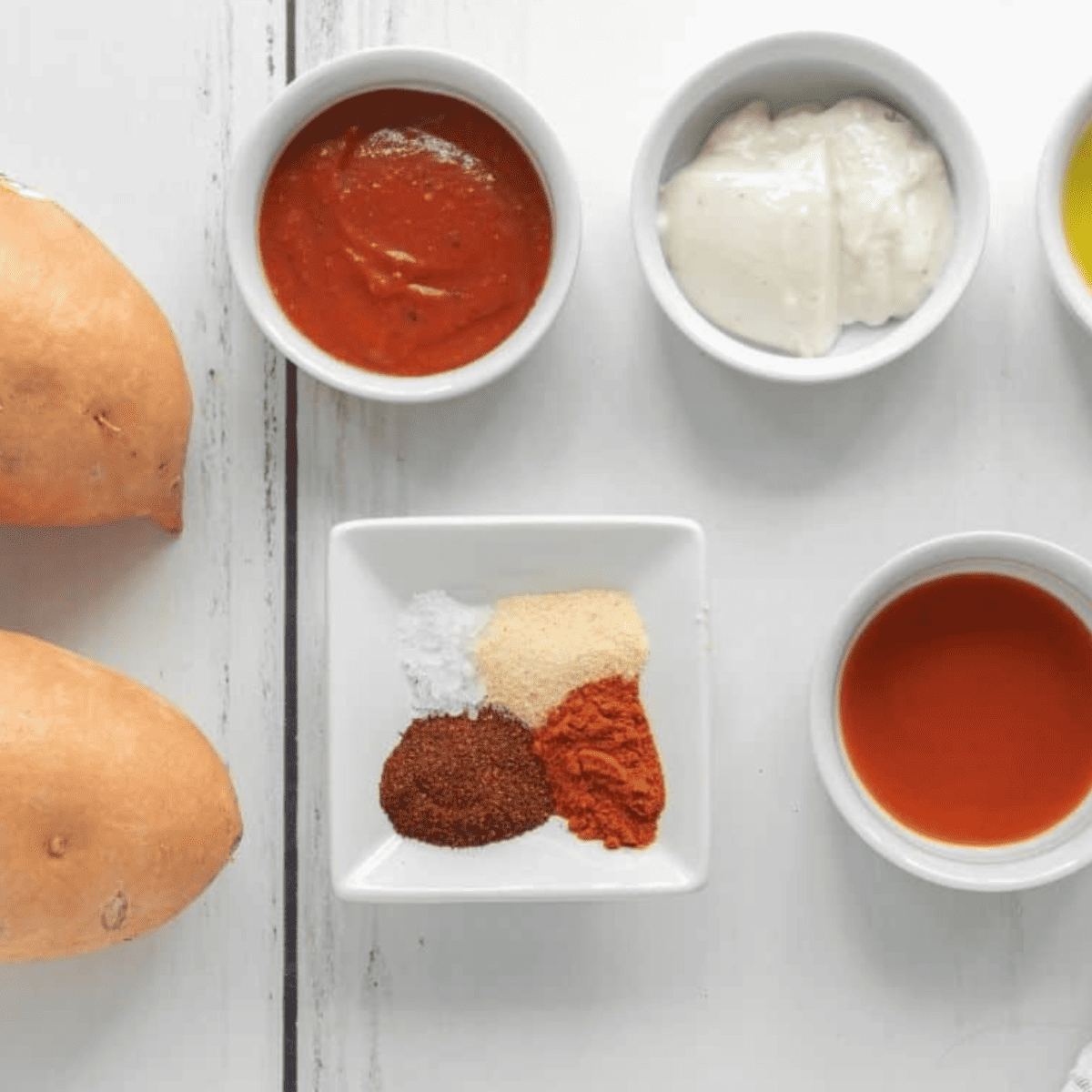 Ingredients needed for Outback Steakhouse Sweet Potato Fries Recipe on kitchen table.