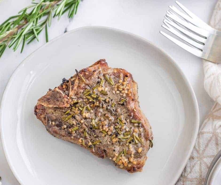 air fryer lamb chop on a white plate