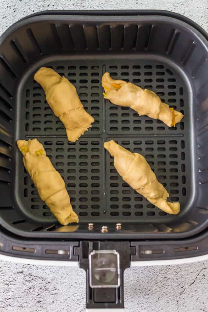 Rolled Up Crescent Rolls in Air Fryer Basket