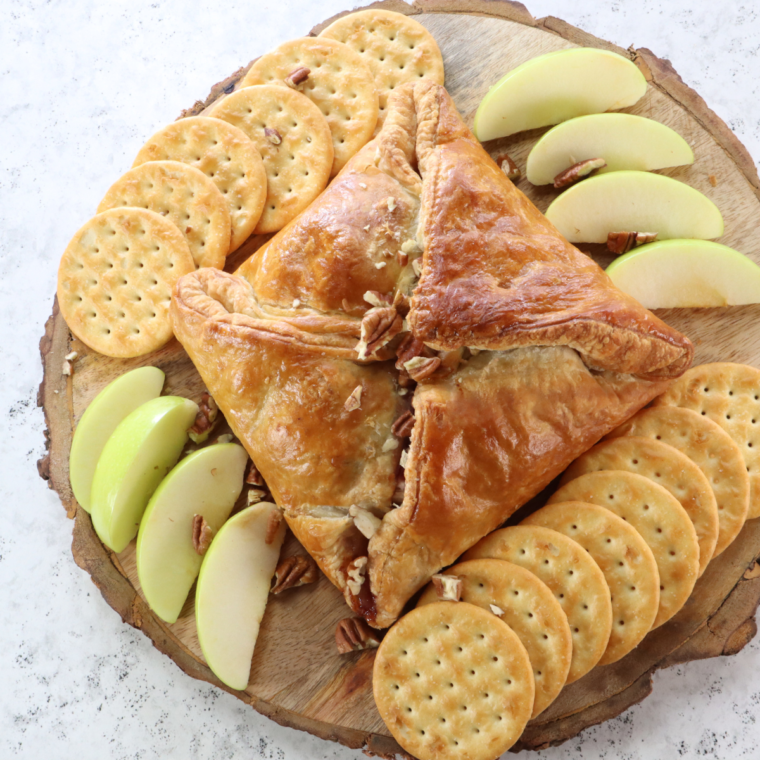 Quick and Convenient: The air fryer significantly reduces the cooking time compared to a conventional oven. You can have delicious Baked Brie ready in just a fraction of the time, making it perfect for impromptu gatherings or when you need a quick appetizer.
Perfectly Cooked: Air fryers are excellent at creating a uniformly heated environment. Your Brie will come out evenly warm and gooey every time, with a deliciously soft center and a gently crisped exterior.
Easy Cleanup: Since air fryers require little to no oil, there's less mess involved compared to traditional baking or frying. Most air fryer baskets are non-stick and dishwasher safe, making cleanup a breeze.
Versatile and Customizable: This recipe can be easily adapted to include your favorite toppings like jams, nuts, honey, or herbs. You can tailor it to suit your taste preferences or to complement the other dishes in your meal.
Perfect Texture: The air fryer excels in providing that desirable slight crispiness to the pastry (if you choose to use it) while keeping the cheese inside perfectly melted.
Energy Efficient: Air fryers generally use less energy than ovens, making this recipe more eco-friendly.
Year-Round Enjoyment: Unlike oven baking, which can heat up the house, the air fryer lets you enjoy Baked Brie any time, even during warmer months.
Impressive Yet Simple: Baked Brie always has a gourmet appeal, but this air fryer recipe is so simple that even novice cooks can impress their guests with minimal effort.
Ideal for Small Servings: If you're cooking for one or two, the air fryer is ideal for making smaller servings without heating up the oven.
Healthier Option: Air frying is a healthier cooking method as it requires less fat, making this a relatively guilt-free indulgence.
This Easy Air Fryer Baked Brie recipe is not just about savoring the creamy and rich flavors of melted cheese; it's about enjoying an effortlessly elegant and satisfying gourmet appetizer.
