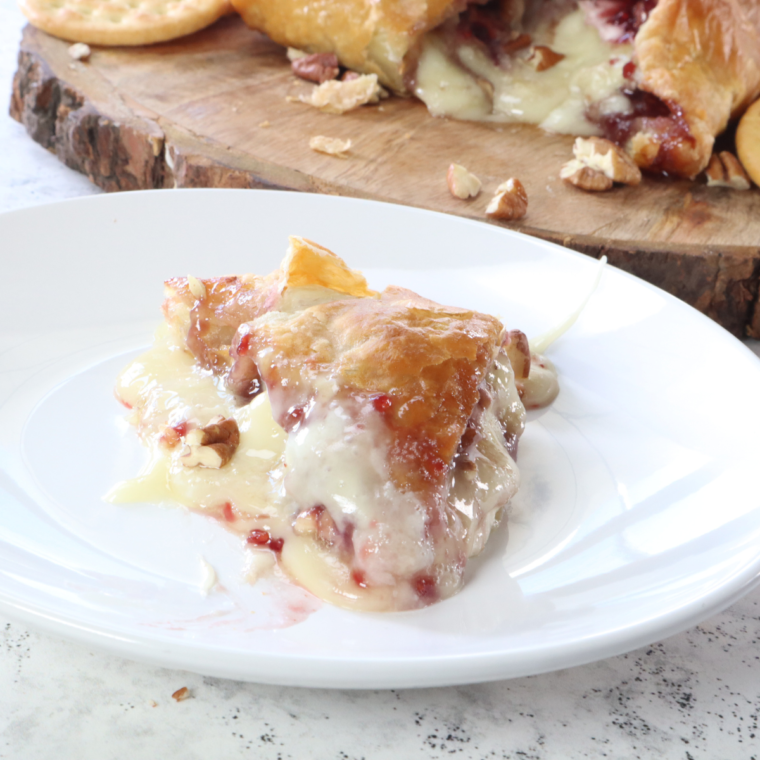 Quick and Convenient: The air fryer significantly reduces the cooking time compared to a conventional oven. You can have delicious Baked Brie ready in just a fraction of the time, making it perfect for impromptu gatherings or when you need a quick appetizer.
Perfectly Cooked: Air fryers are excellent at creating a uniformly heated environment. Your Brie will come out evenly warm and gooey every time, with a deliciously soft center and a gently crisped exterior.
Easy Cleanup: Since air fryers require little to no oil, there's less mess involved compared to traditional baking or frying. Most air fryer baskets are non-stick and dishwasher safe, making cleanup a breeze.
Versatile and Customizable: This recipe can be easily adapted to include your favorite toppings like jams, nuts, honey, or herbs. You can tailor it to suit your taste preferences or to complement the other dishes in your meal.
Perfect Texture: The air fryer excels in providing that desirable slight crispiness to the pastry (if you choose to use it) while keeping the cheese inside perfectly melted.
Energy Efficient: Air fryers generally use less energy than ovens, making this recipe more eco-friendly.
Year-Round Enjoyment: Unlike oven baking, which can heat up the house, the air fryer lets you enjoy Baked Brie any time, even during warmer months.
Impressive Yet Simple: Baked Brie always has a gourmet appeal, but this air fryer recipe is so simple that even novice cooks can impress their guests with minimal effort.
Ideal for Small Servings: If you're cooking for one or two, the air fryer is ideal for making smaller servings without heating up the oven.
Healthier Option: Air frying is a healthier cooking method as it requires less fat, making this a relatively guilt-free indulgence.
This Easy Air Fryer Baked Brie recipe is not just about savoring the creamy and rich flavors of melted cheese; it's about enjoying an effortlessly elegant and satisfying gourmet appetizer.