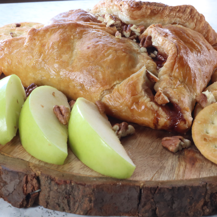 Mastering Air Fryer Baked Brie is all about the details. Here are some pro tips to help you create an unforgettable appetizer:
Choose the Right Brie: Opt for a high-quality Brie cheese. The taste and texture of the cheese are crucial, as it's the centerpiece of this dish.
Room Temperature Cheese: Start with Brie that's at room temperature. This ensures that the cheese will melt evenly and thoroughly.
Prep the Air Fryer: Preheat your air fryer before adding the Brie. A preheated air fryer ensures the cheese cooks evenly.
Puff Pastry Tips: If you're wrapping the Brie in puff pastry, roll the pastry out thinly. This prevents the pastry from becoming too doughy and helps it cook through completely.
Egg Wash for Golden Color: Brushing the puff pastry with an egg wash (beaten egg with a bit of water or milk) will give it a beautiful golden color and a nice shine.
Adding Toppings: If adding toppings like jam, nuts, or honey, consider the flavor balance. You want to complement the Brie, not overpower it.
Avoid Overcooking: Keep a close eye on the Brie, especially if it's not wrapped in pastry. Overcooking can cause the cheese to ooze excessively and lose its shape.
Use Parchment Paper: If your air fryer basket isn't non-stick, consider using a piece of parchment paper to prevent sticking and make removal easier.
Serving: Serve the Baked Brie immediately after cooking while it's warm and gooey. Accompany it with baguette slices, sourdough bread, crackers, or fruit.
Resting Time: Allow the Brie to rest for a few minutes after cooking. This makes it easier to transfer to a serving plate without breaking.
Garnish for Appeal: Garnishing your Baked Brie with fresh herbs or a drizzle of honey can add both flavor and visual appeal.
Experiment with Flavors: Don’t be afraid to experiment with different combinations of toppings and flavors. Baked Brie is incredibly versatile.
By following these tips, you'll elevate your Air Fryer Baked Brie, impressing guests with its perfect creaminess, flavor, and texture blend.