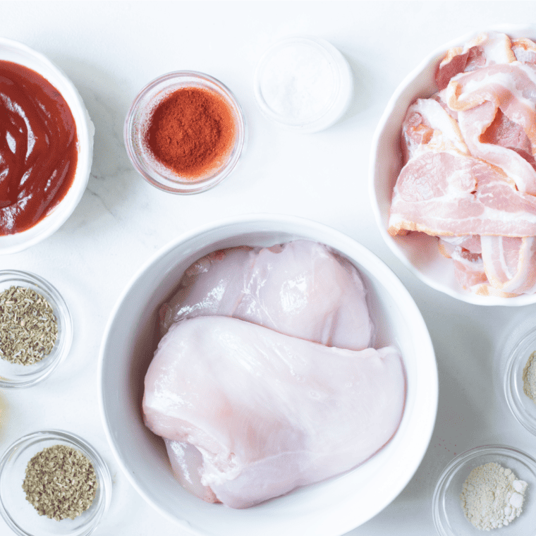 Ingredients needed for Air Fryer Bacon Wrapped Chicken Bites on kitchen table.