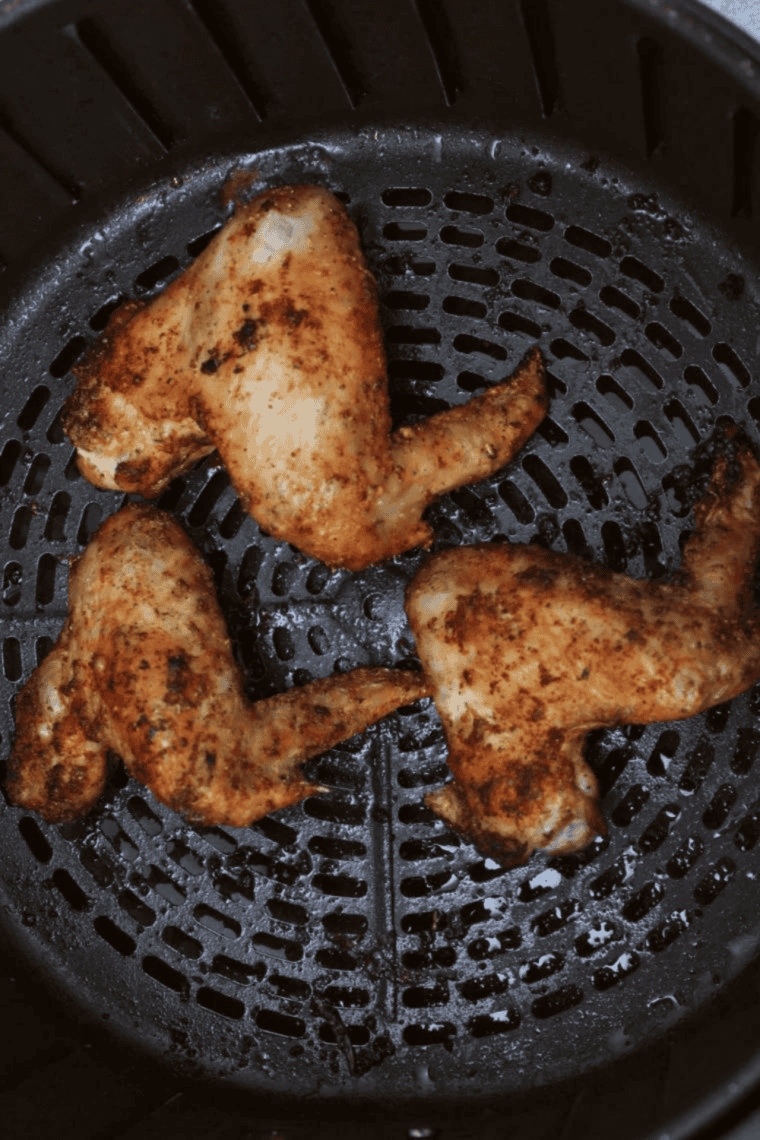 Checking for doneness on air fryer chicken wings