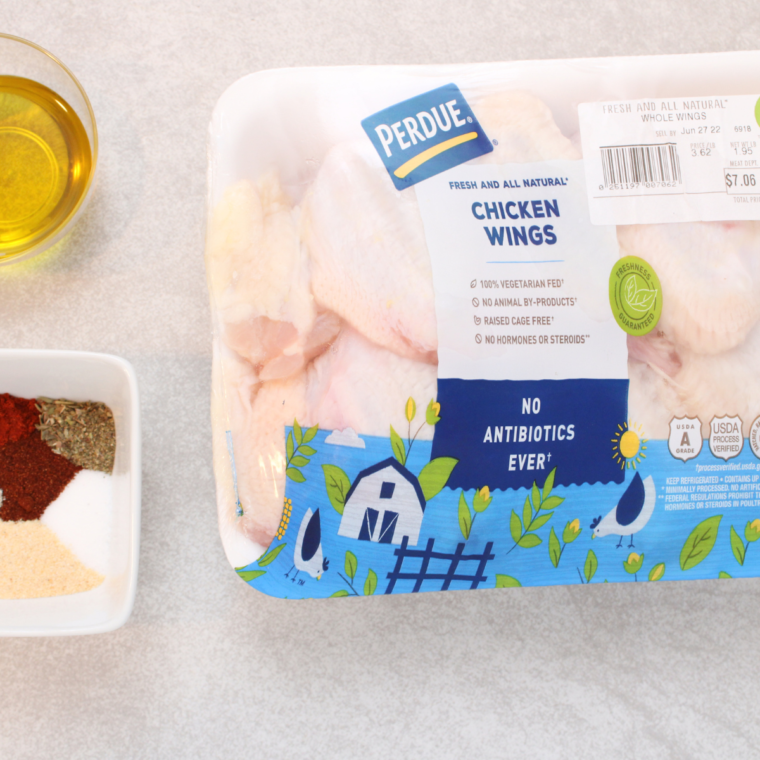 Ingredients needed for Air Fryer Dry Rubbed Chicken Wings on kitchen table.