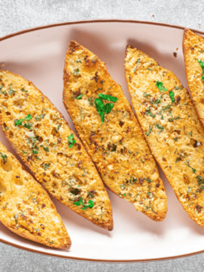 Air fryer garlic bread with fresh herbs, real butter, and parmesan. Crispy outside, soft inside, ready in under 10 minutes — no preheating needed.