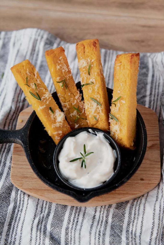 Air fryer polenta fries served with aioli for dipping