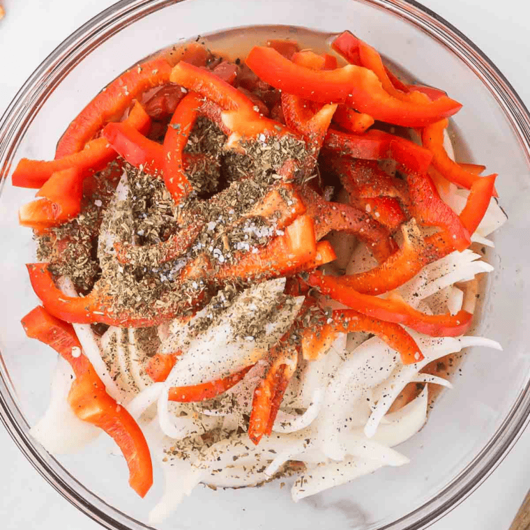 Dice mushrooms and roasted red peppers, toss with olive oil, salt, and pepper."
