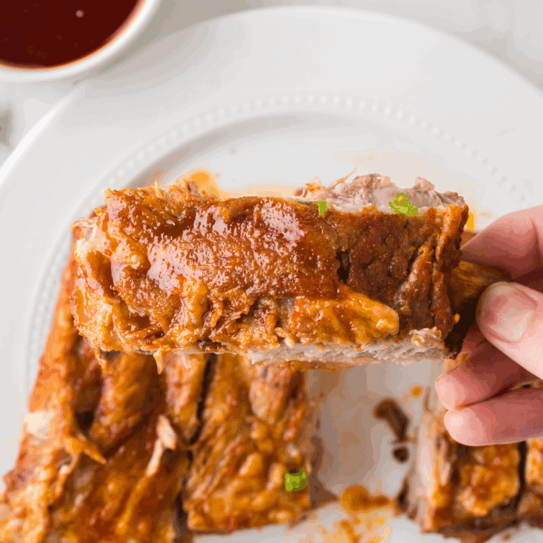 Simmer sauce in Instant Pot until slightly thickened, coat ribs.
