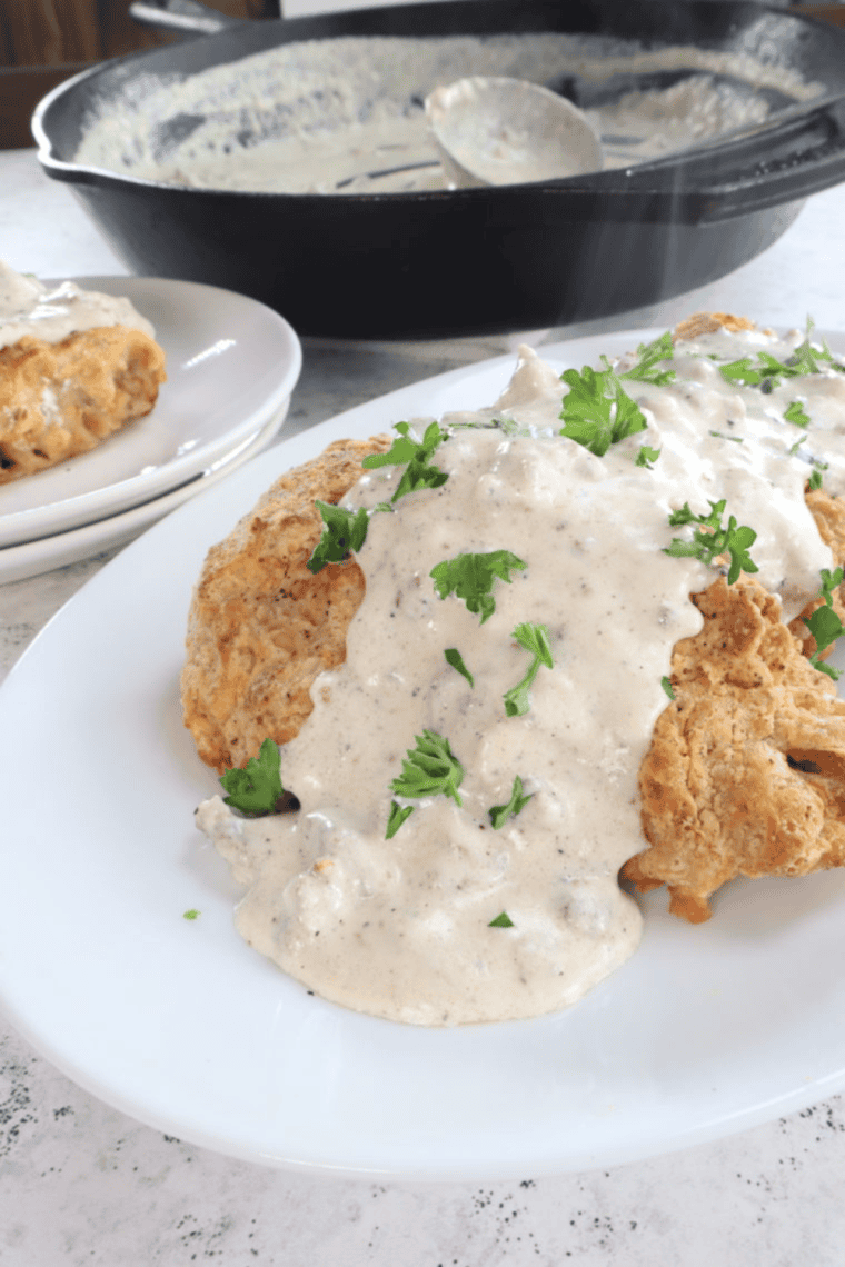 Golden, crispy chicken fried steak topped with creamy country gravy, Cracker Barrel copycat style.