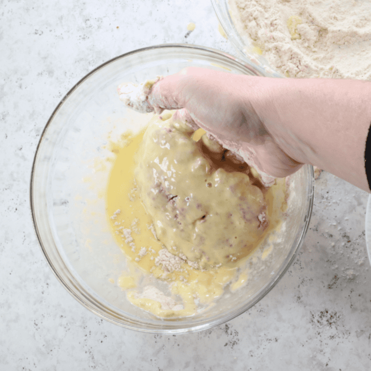 Dip the fried chicken into the egg mixture.