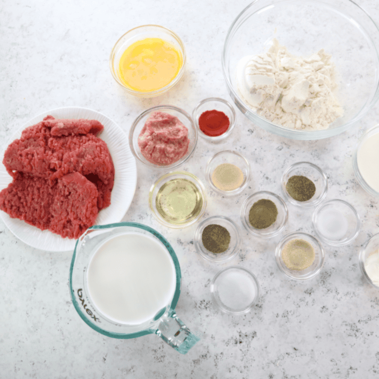 Copycat Cracker Barrel Chicken Fried Steak Ingredients on kitchen table.