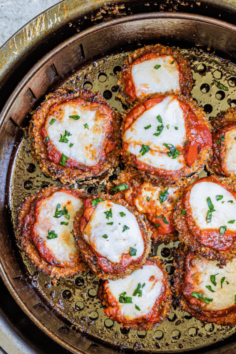 Make Cheesecake Factory–style Eggplant Parmesan at home with crispy breaded eggplant, rich marinara, and melty cheese. An easy copycat recipe that tastes like restaurant comfort food.